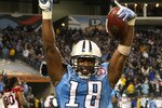 NASHVILLE, TN - NOVEMBER 29:  Kenny Britt #18 of the Tennessee Titans celebrates after catching the game-winning touchdown to give the Titans a 20-17 victory over the Arizona Cardinals during their game at LP Field on November 29, 2009 in Nashville, Tennessee.  (Photo by Streeter Lecka/Getty Images)