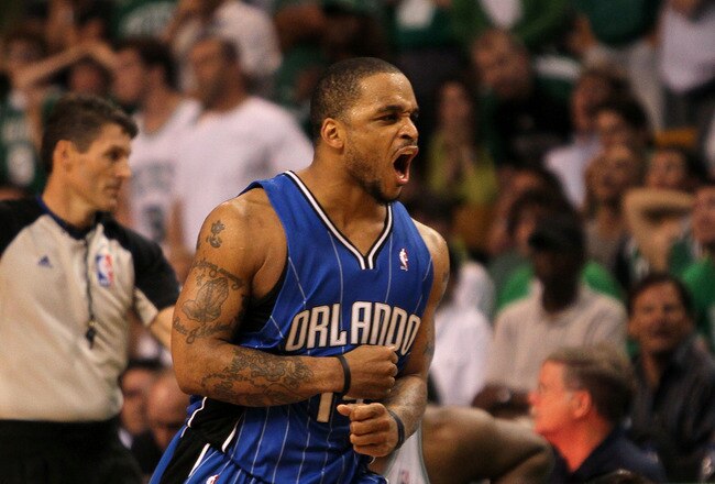 BOSTON - MAY 24:  Jameer Nelson #14 of the Orlando Magic reacts after he made a 3-point shot in overtime against the Boston Celtics in Game Four of the Eastern Conference Finals during the 2010 NBA Playoffs at TD Banknorth Garden on May 24, 2010 in Boston, Massachusetts.  NOTE TO USER: User expressly acknowledges and agrees that, by downloading and/or using this Photograph, user is consenting to the terms and conditions of the Getty Images License Agreement.  (Photo by Jim Rogash/Getty Images)