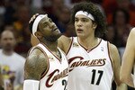 CLEVELAND - MAY 01: LeBron James #23 of the Cleveland Cavaliers reacts next to Anderson Varejao #17 after missing a layup against the Boston Celtics in Game One of the Eastern Conference Semifinals during the 2010 NBA Playoffs at Quicken Loans Arena on May 1, 2010 in Cleveland, Ohio.  NOTE TO USER: User expressly acknowledges and agrees that, by downloading and or using this photograph, User is consenting to the terms and conditions of the Getty Images License Agreement.  (Photo by Gregory Shamus/Getty Images)