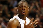 MIAMI - APRIL 25:  Guard Dwyane Wade #3 of the Miami Heat reacts against the Boston Celtics in Game Four of the Eastern Conference Quarterfinals during the 2010 NBA Playoffs at American Airlines Arena on April 25, 2010 in Miami, Florida. Wdae had 46 points as the Heat defeated the Celtics 101-92. NOTE TO USER: User expressly acknowledges and agrees that, by downloading and/or using this Photograph, User is consenting to the terms and conditions of the Getty Images License Agreement.  (Photo by Marc Serota/Getty Images)