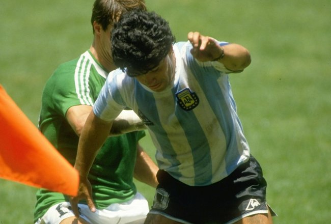 29 Jul 1986:  Diego Maradona (right) of Argentina takes on Thomas Berthold of West Germany during the World Cup final at the Azteca Stadium in Mexico City. Argentina won the match 3-2. \ Mandatory Credit: Allsport UK /Allsport