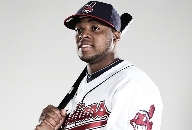 GOODYEAR, AZ - FEBRUARY 28:  (EDITORS NOTE: This images was digitally desaturated.) Carlos Santana #77 poses for a portrait during the Cleveland Indians Photo Day at the training complex at Goodyear Stadium on February 28, 2010 in Goodyear, Arizona.  (Photo by Jonathan Ferrey/Getty Images)
