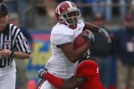 OXFORD, MS - OCTOBER 10:  Receiver Marquis Maze #4 looks for extra yardage during their game against the Mississippi Rebels at Vaught-Hemingway Stadium on October 10, 2009 in Oxford, Mississippi. (Photo by Dave Martin/Getty Images)