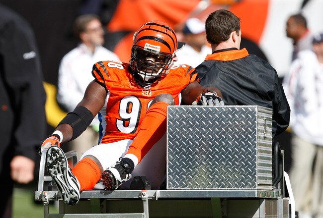CINCINNATI, OH - OCTOBER 18: Defensive end Antwan Odem #98 of the Cincinnati Bengals is taken off the field on a cart after an injury against the Houston Texans at Paul Brown Stadium on October 18, 2009 in Cincinnati, Ohio. (Photo by Scott Boehm/Getty Images)
