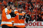 PHILADELPHIA - MAY 24:  Jeff Carter #17 of the Philadelphia Flyers celebrates with Mike Richards #18 after scoring a goal in the second period against the Montreal Canadiens in Game 5 of the Eastern Conference Finals during the 2010 NHL Stanley Cup Playoffs at Wachovia Center on May 24, 2010 in Philadelphia, Pennsylvania.  (Photo by Jim McIsaac/Getty Images)