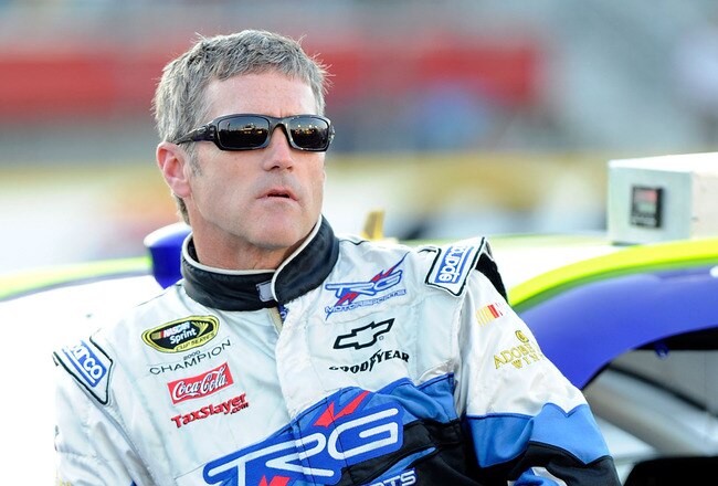 CONCORD, NC - MAY 27:  Bobby Labonte leans on the #71 TRG Motorsports Chevrolet, during qualifying for the NASCAR Sprint Cup Series Coca-Cola 600 at Charlotte Motor Speedway on May 27, 2010 in Concord, North Carolina.  (Photo by John Harrelson/Getty Images)