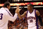 PHOENIX - MAY 25:  Steve Nash #13 of the Phoenix Suns congratulates teammate Leandro Barbosa #10 after a play against the Los Angeles Lakers in the fourth quarter of Game Four of the Western Conference Finals during the 2010 NBA Playoffs at US Airways Center on May 25, 2010 in Phoenix, Arizona. NOTE TO USER: User expressly acknowledges and agrees that, by downloading and/or using this Photograph, user is consenting to the terms and conditions of the Getty Images License Agreement.  (Photo by Christian Petersen/Getty Images)