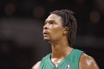 CHARLOTTE, NC - MARCH 16:  Chris Bosh #4 of the Toronto Raptors looks on against the Charlotte Bobcats during their game at Time Warner Cable Arena on March 16, 2009 in Charlotte, North Carolina.  NOTE TO USER: User expressly acknowledges and agrees that, by downloading and/or using this Photograph, user is consenting to the terms and conditions of the Getty Images License Agreement. (Photo by: Streeter Lecka/Getty Images)