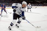 UNIONDALE, NY - FEBRUARY 13:  Alex Tanguay #13 of the Tampa Bay Lightning skates against the New York Islanders on February 13, 2010 at Nassau Coliseum in Uniondale, New York. The Isles defeated the Lightning 5-4.  (Photo by Jim McIsaac/Getty Images)
