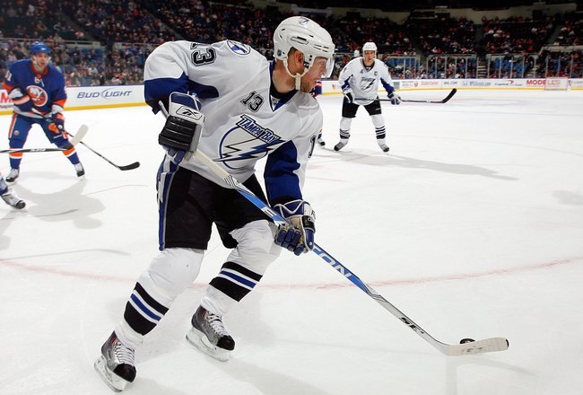 UNIONDALE, NY - FEBRUARY 13:  Alex Tanguay #13 of the Tampa Bay Lightning skates against the New York Islanders on February 13, 2010 at Nassau Coliseum in Uniondale, New York. The Isles defeated the Lightning 5-4.  (Photo by Jim McIsaac/Getty Images)