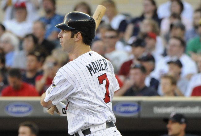 MINNEAPOLIS, MN - MAY 27: Joe Mauer #7 of the Minnesota Twins bats in the first inning against the New York Yankees during the game on May 27, 2010 at Target Field in Minneapolis, Minnesota. The Twins defeated the Yankees 8-2. (Photo by Hannah Foslien/Getty Images)