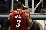 BOSTON - APRIL 20:  Dwyane Wade #3 of the Miami Heat does a pull up on the basket before the game against the Boston Celtics during Game Two of the Eastern Conference Quarterfinals of the 2010 NBA playoffs at the TD Garden on April 20, 2010 in Boston, Massachusetts.  NOTE TO USER: User expressly acknowledges and agrees that, by downloading and or using this photograph, User is consenting to the terms and conditions of the Getty Images License Agreement.  (Photo by Elsa/Getty Images)