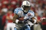 HOUSTON - NOVEMBER 23:  Running back LenDale White #25 of the Tennessee Titans carries the all against the Houston Texans on November 23, 2009  at Reliant Stadium in Houston, Texas.  (Photo by Stephen Dunn/Getty Images)