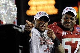 PASADENA, CA - JANUARY 07:  Running back Mark Ingram #22 and defensive lineman Marcell Dareus #57 of the Alabama Crimson Tide celebrate after winning the Citi BCS National Championship game over the Texas Longhorns at the Rose Bowl on January 7, 2010 in Pasadena, California. The Crimson Tide defeated the Longhorns 37-21.  (Photo by Kevork Djansezian/Getty Images)
