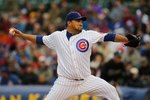 CHICAGO - MAY 12: Starting pitcher Carlos Silva #52 of the Chicago Cubs delivers the ball against the Florida Marlins at Wrigley Field on May 12, 2010 in Chicago, Illinois. The Cubs defeated the Marlins 4-3.  (Photo by Jonathan Daniel/Getty Images)