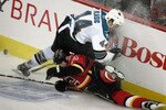 CALGARY, CANADA - APRIL 20: Craig Conroy #24 of the Calgary Flames can't beat Marc-Edouard Vlasic #44 of the San Jose Sharks to the puck for an icing callduring Game 6 of the 2008 NHL Western Conference Quarterfinals at Pengrowth Saddledome April 20, 2008 in Calgary, Alberta, Canada.  The Flames defeated the Sharks 2 - 0. (Photo by Mike Ridewood/Getty Images) ***Local caption*** Craig Conroy;Marc-Edouard Vlasic