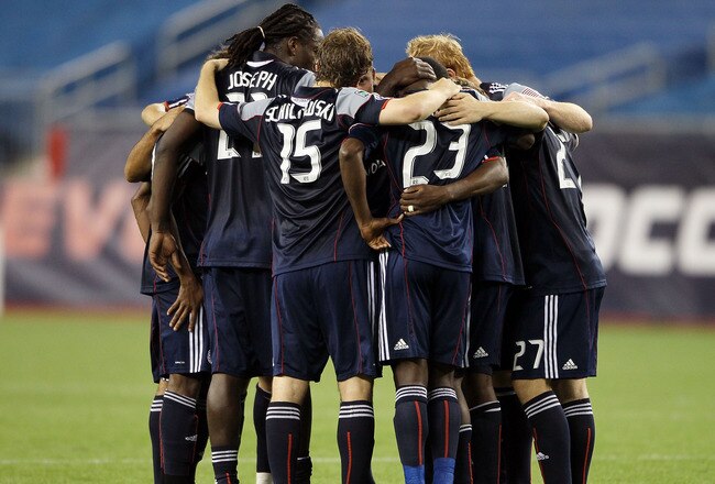 FOXBORO, MA - MAY 29:  The New England Revolution huddle after their teammate, Preston Burpo #24 was injured in the first half against the New York Red Bulls on May 29, 2010 at Gillette Stadium in Foxboro, Massachusetts.  (Photo by Elsa/Getty Images)