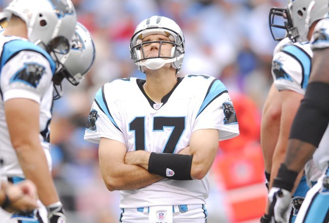 CHARLOTTE, NC - OCTOBER 8:  Quarterback Jake Delhomme #17 of the Carolina Panthers talks to his teammates in the huddle during the game against the Cleveland Browns on October 8, 2006, at Bank of America Stadium in Charlotte, North Carolina. Carolina won 20-12. (Photo by Grant Halverson/Getty Images) 