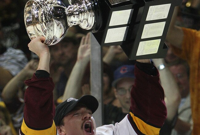 ROSEMONT, IL - JUNE 10: Kevin Doell #21 of the Chicago Wolves celebrates with the Calder Cup trophy following a championship win over the Wilkes-Barre/Scranton Penguins during the Calder Cup Finals on June 10, 2008 at the Allstate Arena in Rosemont, Illinois. The Wolves defeated the Penguins 5-2 to capture the Calder Cup. (Photo by Jonathan Daniel/Getty Images)