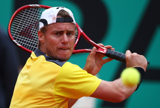 PARIS - MAY 29:  Lleyton Hewitt of Australia plays a backhand during the men's singles third round match between Rafael Nadal of Spain and Lleyton Hewitt of Australia on day seven of the French Open at Roland Garros on May 29, 2010 in Paris, France.  (Photo by Clive Brunskill/Getty Images)