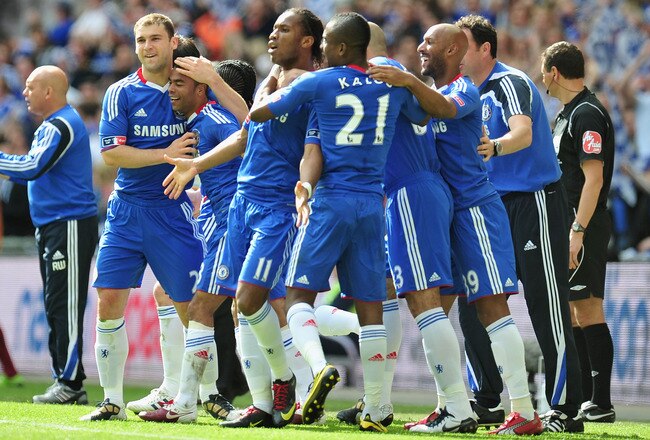 LONDON, ENGLAND - MAY 15:  Didier Drogba of Chelsea celebrates with his team mates after scoring the opening goal with a free kick during the FA Cup sponsored by E.ON Final match between Chelsea and Portsmouth at Wembley Stadium on May 15, 2010 in London, England.  (Photo by Clive Mason/Getty Images)