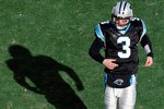 CHARLOTTE, NC - JANUARY 03:  Quarterback Matt Moore #3 of the Carolina Panthers jogs on the field during the game against the New Orleans Saints at Bank of America Stadium on January 3, 2010 in Charlotte, North Carolina.  (Photo by Streeter Lecka/Getty Images)