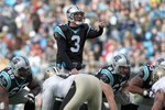 CHARLOTTE, NC - JANUARY 03:  Quarterback Matt Moore #3 of the Carolina Panthers calls the play during the game against the New Orleans Saints at Bank of America Stadium on January 3, 2010 in Charlotte, North Carolina.  (Photo by Streeter Lecka/Getty Images)