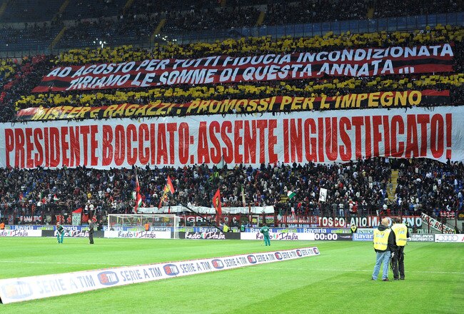 MILAN, ITALY - MAY 15:  Fans of AC Milan hold banners during the Serie A match between AC Milan and Juventus FC at Stadio Giuseppe Meazza on May 15, 2010 in Milan, Italy.  (Photo by Massimo Cebrelli/Getty Images)