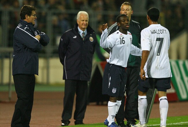 MINSK, BELARUS - OCTOBER 15:  Theo Walcott of England is substituted for Shaun Wright-Phillips as Fabio Capello looks on during the FIFA2010 World Cup Qualifying match between Belarus and England at the Dinamo Stadium on October 15, 2008 in Minsk, Belarus.  (Photo by Alex Livesey/Getty Images)