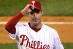PHILADELPHIA - OCTOBER 25:  Jamie Moyer #50 of the Philadelphia Phillies tips his cap as he receives a standing ovation from the fans as he comes out of the game in the top of the seventh inning against the Tampa Bay Rays during game three of the 2008 MLB World Series on October 25, 2008 at Citizens Bank Park in Philadelphia, Pennsylvania.  (Photo by Elsa/Getty Images)