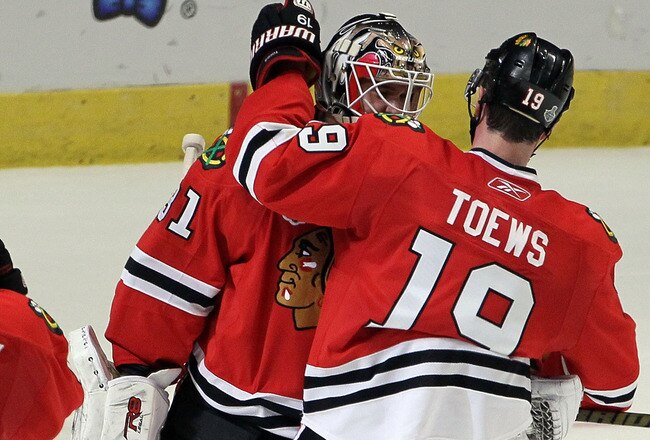 CHICAGO - MAY 29:  Goaltender Antti Niemi #31 and Jonathan Toews #19 of the Chicago Blackhawks celebrate after defeating the Philadelphia Flyers by a score of 6-5 in Game One of the 2010 NHL Stanley Cup Final at the United Center on May 29, 2010 in Chicago, Illinois.  (Photo by Jim McIsaac/Getty Images)