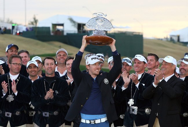 SCOTTSDALE, AZ - FEBRUARY 28: Hunter Mahan is celebrates his victory while holding the trophy after winning the Waste Management Phoenix Open at TPC Scottsdale on February 28, 2010 in Scottsdale, Arizona. (Photo by Hunter Martin/Getty Images)