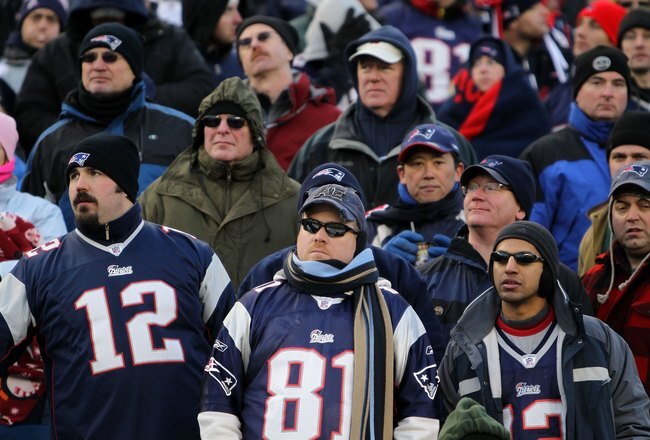 FOXBORO, MA - JANUARY 10:  Fans of the New England Patriots look on dejected from the stands late in the second half against the Baltimore Ravens during the 2010 AFC wild-card playoff game at Gillette Stadium on January 10, 2010 in Foxboro, Massachusetts.  (Photo by Jim Rogash/Getty Images)
