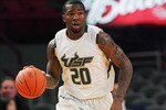 NEW YORK - MARCH 09: Dominique Jones #20 of the University of South Florida dribbles the ball up court against DePaul University during the first round game of the Big East Basketball Tournament at Madison Square Garden on March 9, 2010 in New York City.  (Photo by Chris Trotman/Getty Images)