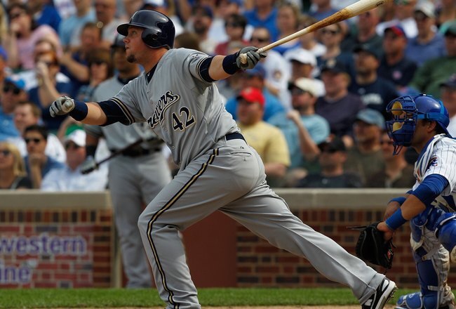 CHICAGO - APRIL 15: Casey McGehee of the Milwaukee Brewers, wearing a number 42 jersey in honor of Jackie Robinson, hits the ball against the Chicago Cubs at Wrigley Field on April 15, 2010 in Chicago, Illinois. The Brewers defeated the Cubs 8-6.  (Photo by Jonathan Daniel/Getty Images)