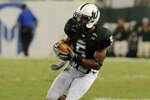 TAMPA, FL - OCTOBER 15:  Safety Nate Allen #5 of the University of South Florida Bulls intercepts a pass against the Cincinnati Bearcats October 15, 2009 at Raymond James Stadium in Tampa, Florida.  (Photo by Al Messerschmidt/Getty Images)