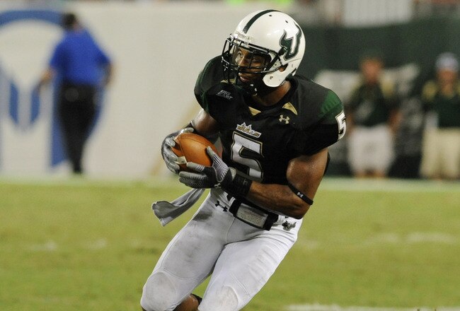 TAMPA, FL - OCTOBER 15:  Safety Nate Allen #5 of the University of South Florida Bulls intercepts a pass against the Cincinnati Bearcats October 15, 2009 at Raymond James Stadium in Tampa, Florida.  (Photo by Al Messerschmidt/Getty Images)