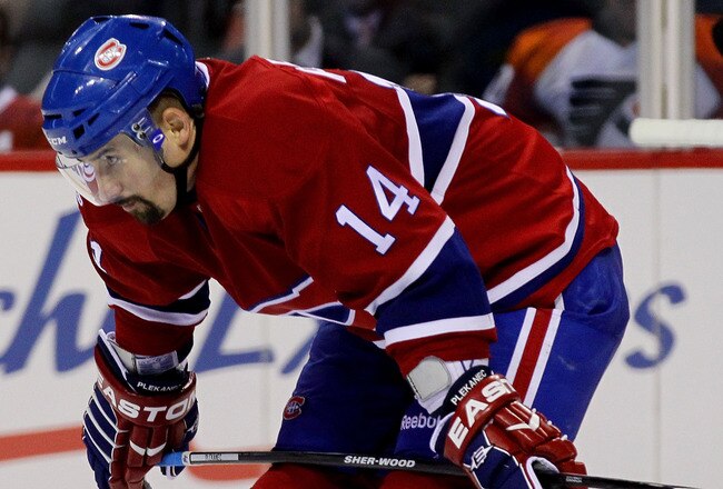 MONTREAL, QC - MAY 22:  Tomas Plekanec #14 of the Montreal Canadiens look on against the Philadelphia Flyers in Game 4 of the Eastern Conference Finals during the 2010 NHL Stanley Cup Playoffs at Bell Centre on May 22, 2010 in Montreal, Canada.  (Photo by Jim McIsaac/Getty Images)