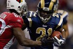 ST. LOUIS - NOVEMBER 22: Oshiomogho Atogwe #21 of the St. Louis Rams recovers a fumble against the Arizona Cardinals at the Edward Jones Dome on November 22, 2009 in St. Louis, Missouri.  The Cardinals beat the Rams 21-13.  (Photo by Dilip Vishwanat/Getty Images)