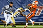 TAMPA, FL - NOVEMBER 28:  Wide receiver Jacoby Ford #6 of the Clemson Tigers bobbles a pass against the Georgia Tech Yellow Jackets in the 2009 ACC Football Championship Game at Raymond James Stadium on December 5, 2009 in Tampa, Florida.  (Photo by Al Messerschmidt/Getty Images)