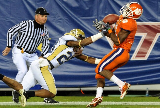 TAMPA, FL - NOVEMBER 28:  Wide receiver Jacoby Ford #6 of the Clemson Tigers bobbles a pass against the Georgia Tech Yellow Jackets in the 2009 ACC Football Championship Game at Raymond James Stadium on December 5, 2009 in Tampa, Florida.  (Photo by Al Messerschmidt/Getty Images)