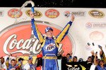 CONCORD, NC - MAY 30:  Kurt Busch, driver of the #2 Miller Lite/Vortex Dodge, celebrates in Victory Lane after winning the NASCAR Sprint Cup Series Coca-Cola 600 at Charlotte Motor Speedway on May 30, 2010 in Concord, North Carolina.  (Photo by John Harrelson/Getty Images)
