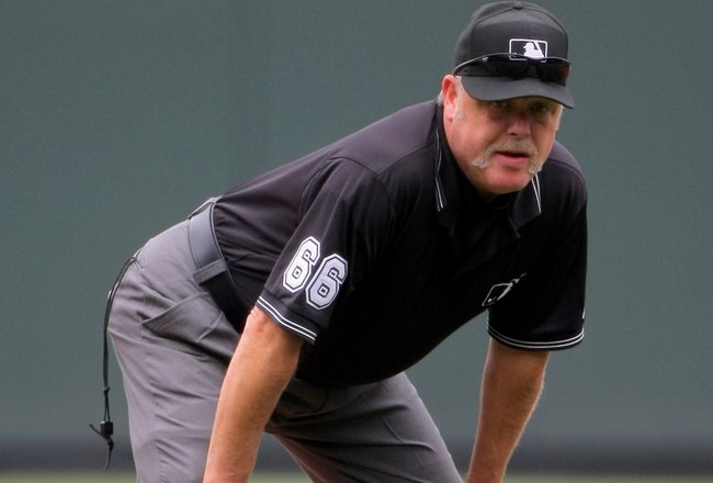 DENVER - AUGUST 23:  Second base umpire Jim Joyce oversees the action between the Colorado Rockies and the San Francisco Giants at Coors Field on August 23, 2009 in Denver, Colorado. The Rockies defeated the Giants 4-2.  (Photo by Doug Pensinger/Getty Images)