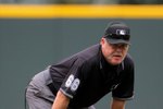 DENVER - AUGUST 23:  Second base umpire Jim Joyce oversees the action between the Colorado Rockies and the San Francisco Giants at Coors Field on August 23, 2009 in Denver, Colorado. The Rockies defeated the Giants 4-2.  (Photo by Doug Pensinger/Getty Images)