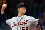 ARLINGTON, TX - JULY 27:  Pitcher Armando Galarraga #58 of the Detroit Tigers throws against the Texas Rangers on July 27, 2009 at Rangers Ballpark in Arlington, Texas.  (Photo by Ronald Martinez/Getty Images)