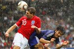 GRAZ, AUSTRIA - MAY 30:  Steven Gerrard of England and Yuki Abe of Japan compete for the ball during the International Friendly between Japan and England at UPC-Arena on May 30, 2010 in Graz, Austria.  (Photo by Mark Kolbe/Getty Images)
