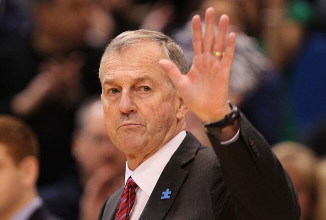 HARTFORD, CT - FEBRUARY 13: Coach Jim Calhoun of the Connecticut Huskies reacts to fans as he walks onto the court before a game against the Cincinnati Bearcats at the XL Center on February 13, 2010 in Hartford, Connecticut. (Photo by Jim Rogash/Getty Images)