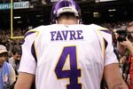 NEW ORLEANS - JANUARY 24:  Brett Favre #4 of the Minnesota Vikings walks off the field after the Vikings lost to the New Orleans Saints 31-28 in overtime during the NFC Championship Game at the Louisiana Superdome on January 24, 2010 in New Orleans, Louisiana.  (Photo by Ronald Martinez/Getty Images)