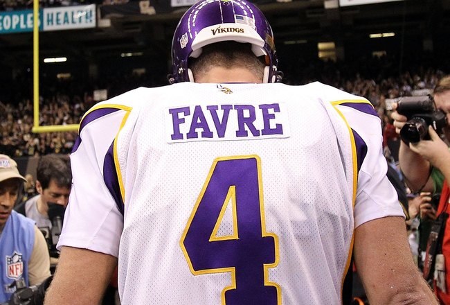 NEW ORLEANS - JANUARY 24:  Brett Favre #4 of the Minnesota Vikings walks off the field after the Vikings lost to the New Orleans Saints 31-28 in overtime during the NFC Championship Game at the Louisiana Superdome on January 24, 2010 in New Orleans, Louisiana.  (Photo by Ronald Martinez/Getty Images)