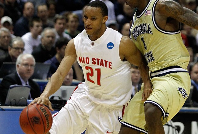 MILWAUKEE - MARCH 21:  Evan Turner #21 of the Ohio State Buckeyes drives on Iman Shumpert #1 of the Georgia Tech Yellow Jackets in the second half during the second round of the 2010 NCAA men's basketball tournament at the Bradley Center on March 21, 2010 in Milwaukee, Wisconsin.  (Photo by Jonathan Daniel/Getty Images)